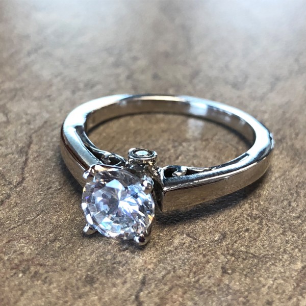 14K White Gold Solitaire Engagement Ring with Surprise Diamond